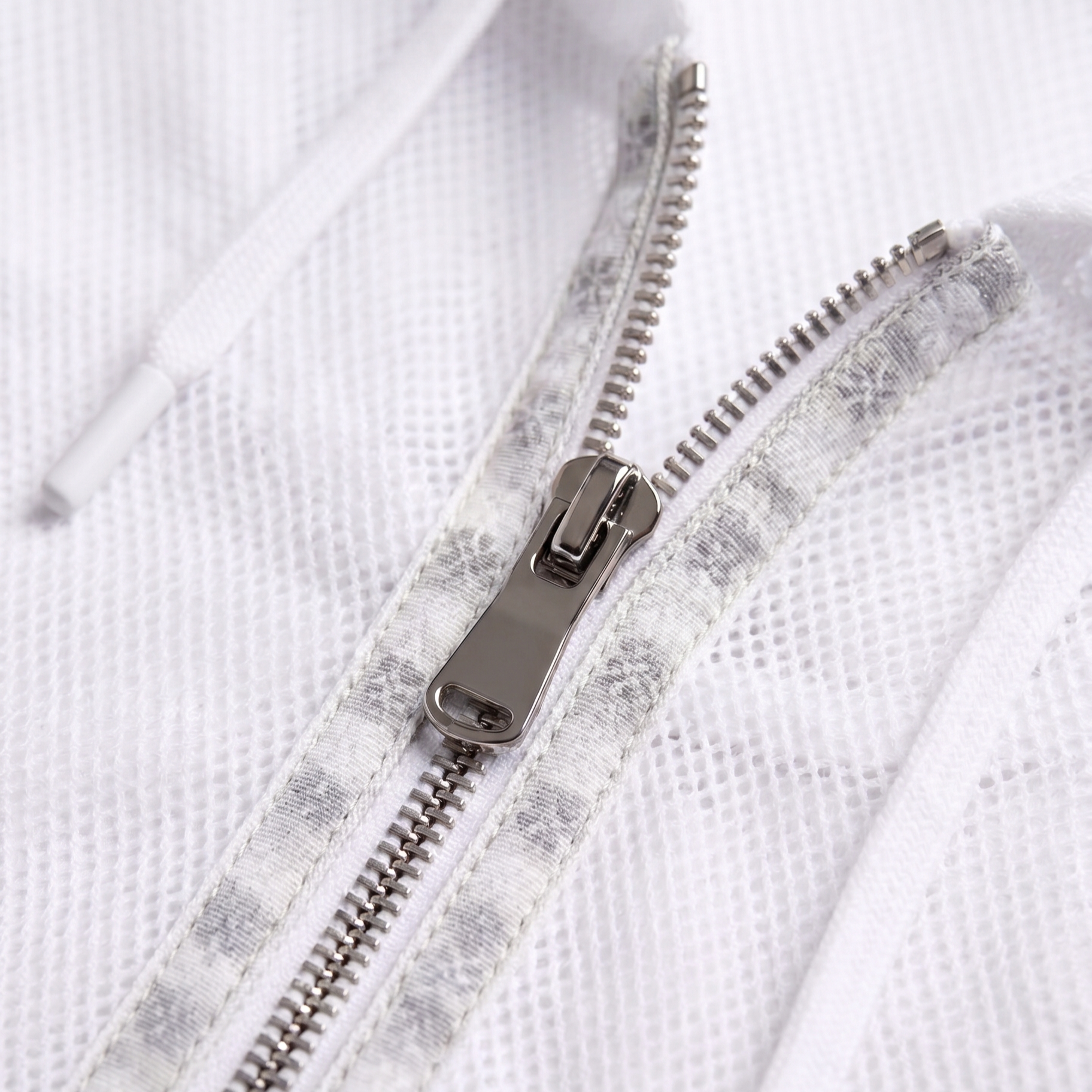 Close-up of Bug Away jacket zip and mesh